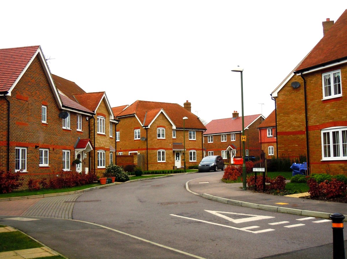 A curving street of red-brick new-build family homes